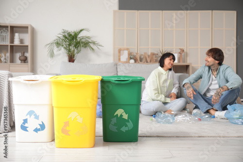 Young couple with container...