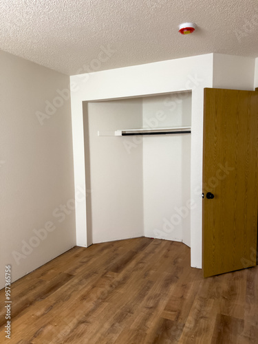 Newly Installed Vinyl Plank Flooring in Empty Room