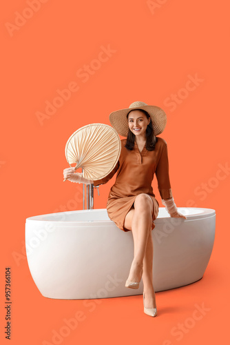 Beautiful woman with fan si...