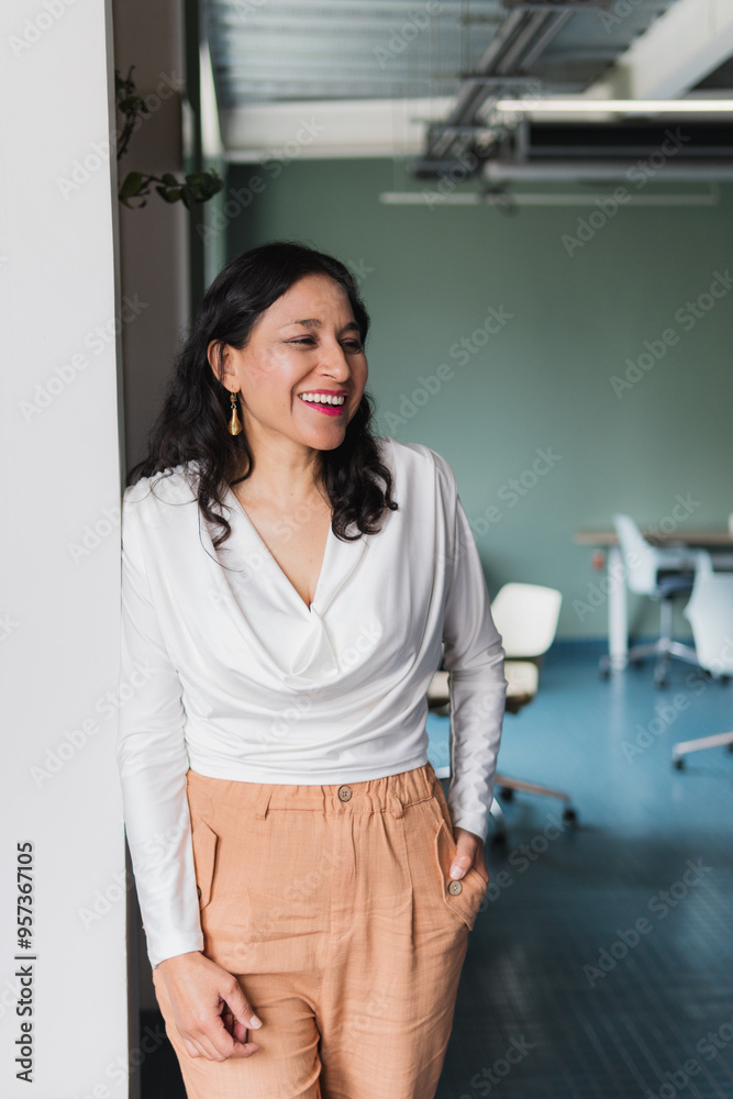 Portrait of a Latina woman in the office. Portrait of a Latina woman in the office.