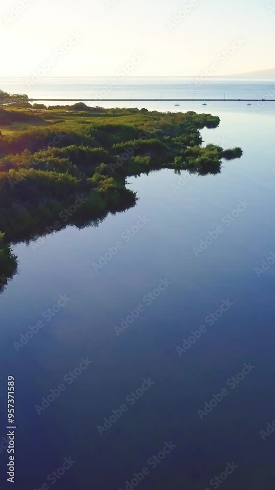 Slow motion aerial over the south coast of Molokai, Hawaii. Slow motion aerial over the south coast of Molokai, Hawaii.