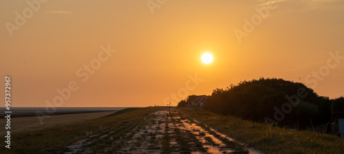 sunset over the dike photo