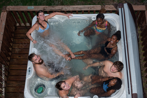 Friends in a hot tub photo