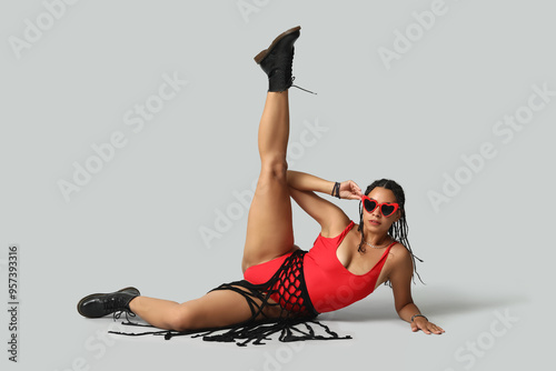 Young woman in red swimsuit...
