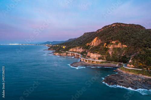 Sunrise Over Seacliff Bridge, Coalcliff, NSW, Australia - Aerial View with Wollongong in the Background photo