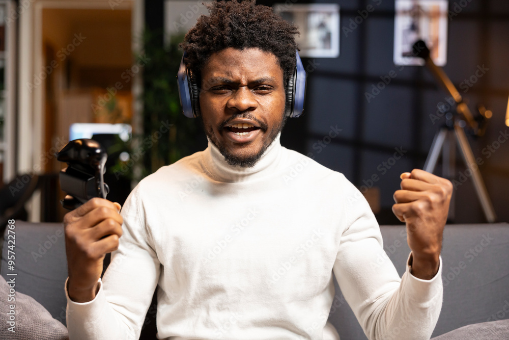 Cheerful gamer bragging after finally defeating all enemies while ...