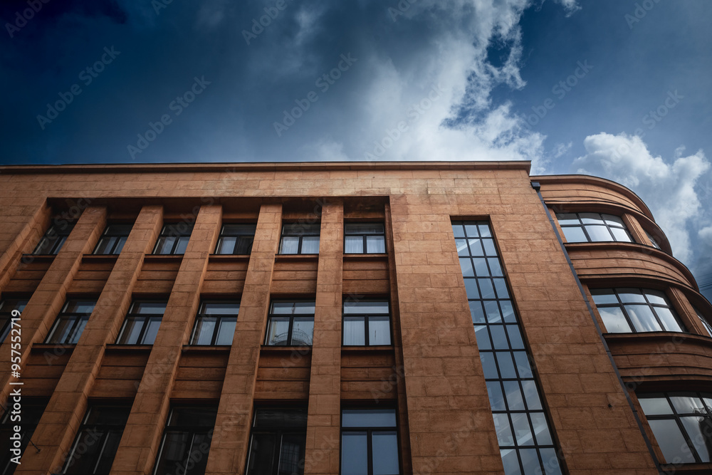 Fototapeta premium Facade of a 1930s business building in Riga, Latvia, featuring modernist architecture typical of the era.