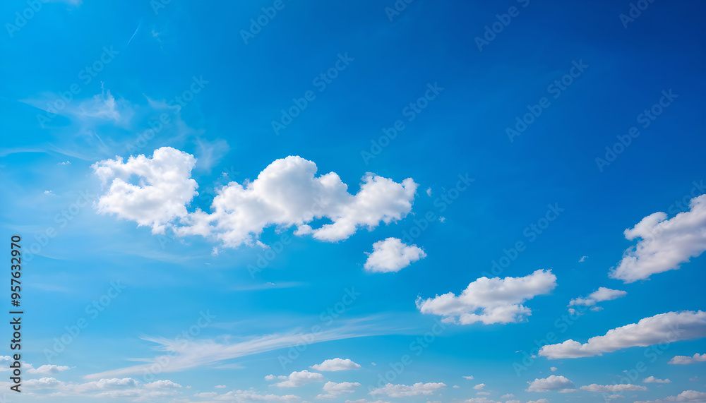Clear Morning Sky with Bright White Cumulus Clouds in a Pale Fresh Blue Atmosphere Creating a Calm, Refreshing Scene Clear Morning Sky with Bright White Cumulus Clouds in a Pale Fresh Blue Atmosphere Creating a Calm, Refreshing Scene