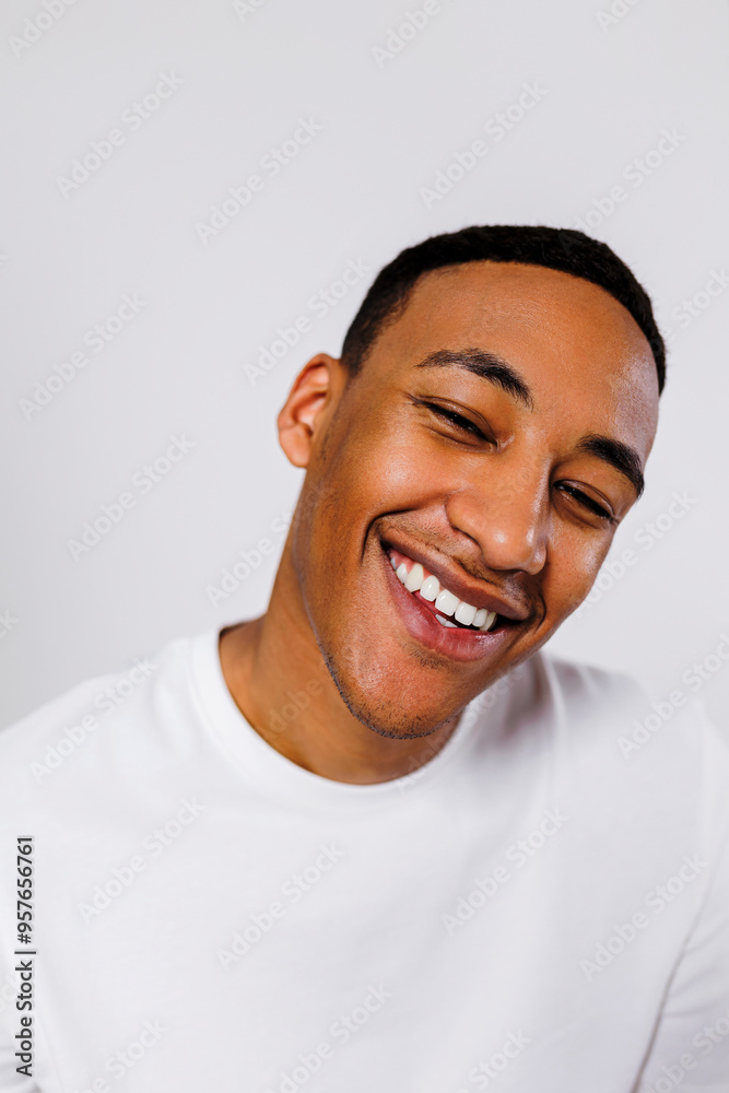 Man smiling and posing on white background Man smiling and posing on white background