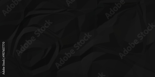 Crumpled texture of dark black wrinkle chaotic paper. close up canvas old crumple black paper sheet abstract shape background space for text.	
