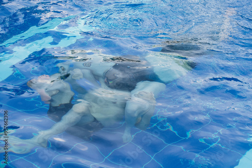 Couple Playing Underwater  photo