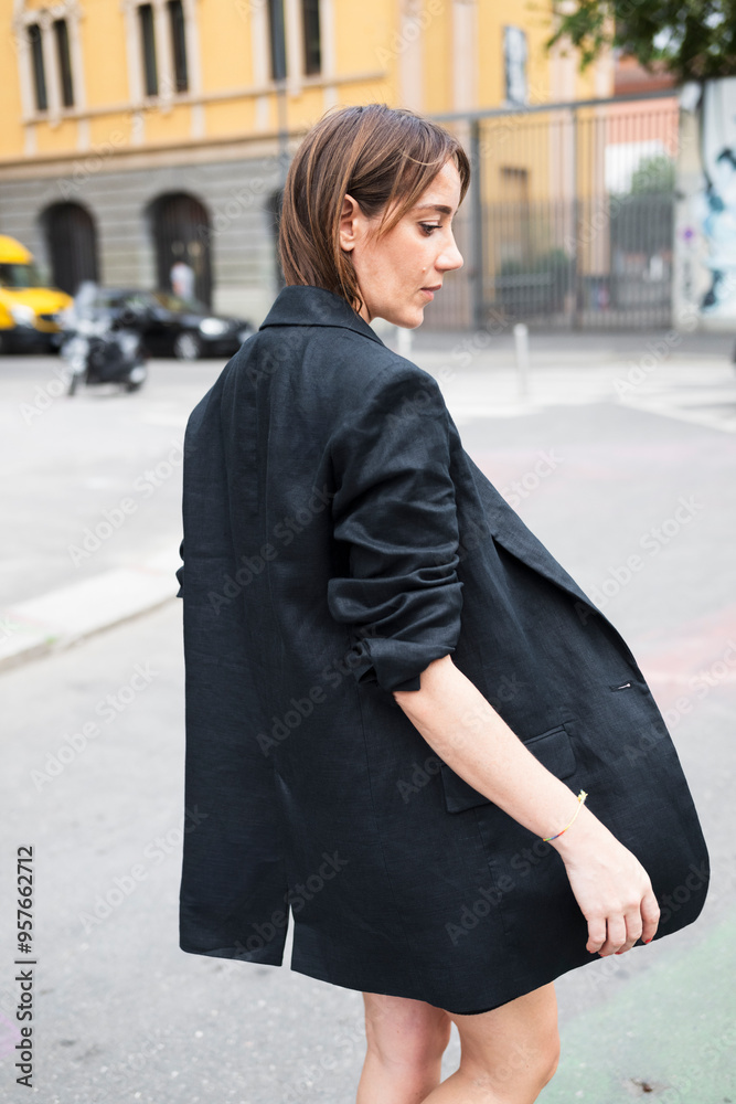 Woman Portrait in Black Coat on Street Woman Portrait in Black Coat on Street