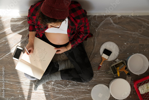 Expecting baby,  mom redecorating baby's room, painting walls