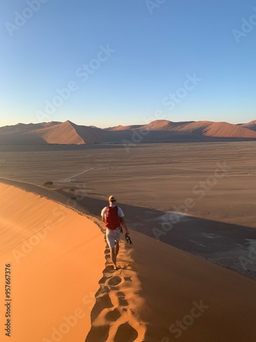 Exploring sandunes Sossusvlei, Namibia photo