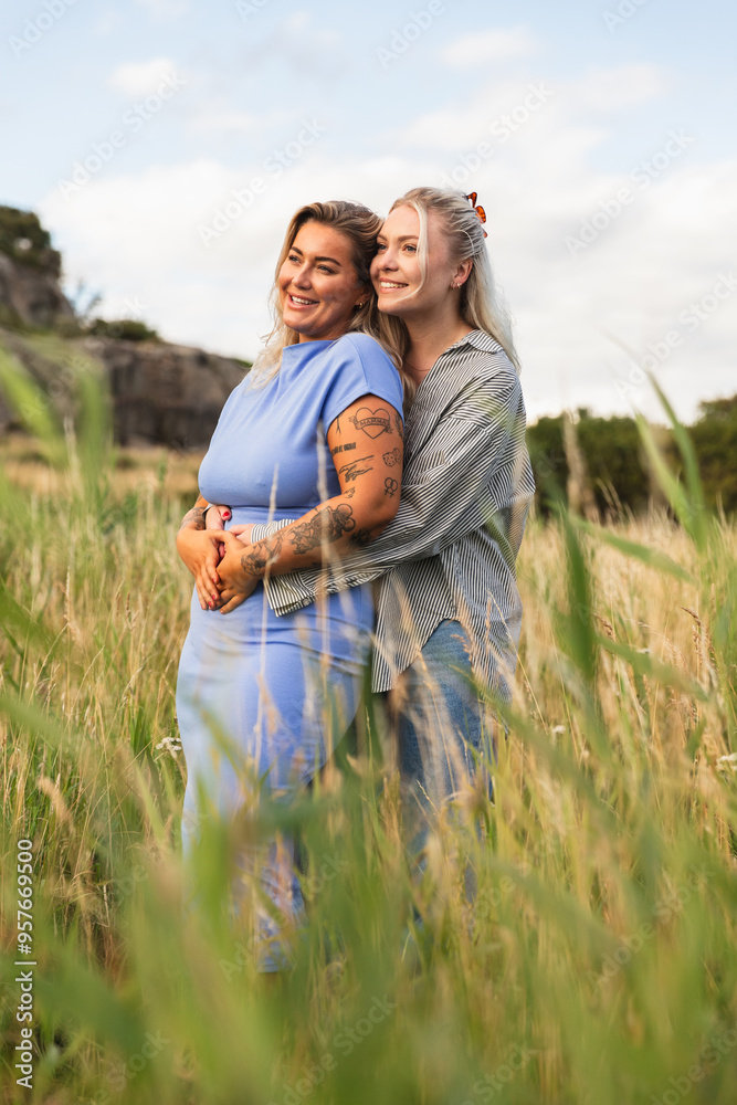 LGBT Couple Embracing in Summer Field LGBT Couple Embracing in Summer Field