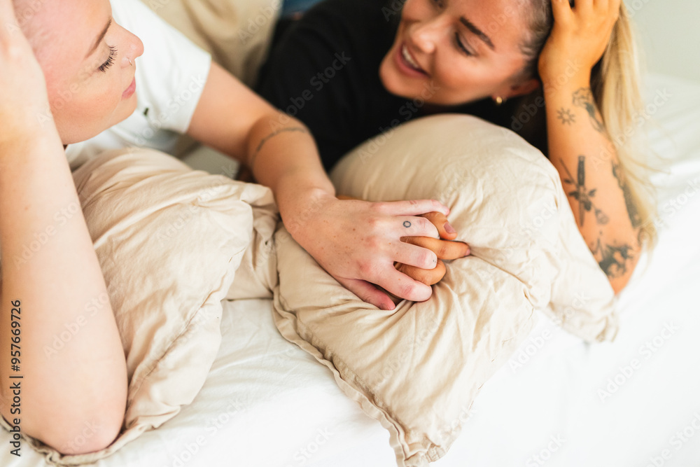 LGBT Woman Couple Hugging on Bed in Morning LGBT Woman Couple Hugging on Bed in Morning