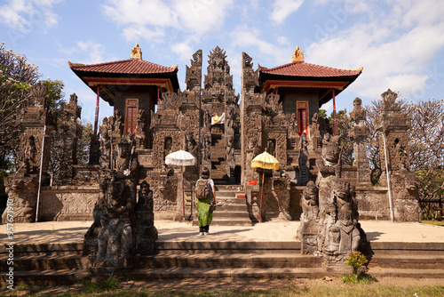Woman in a beatiful temple in Bali
