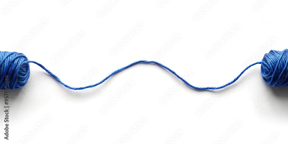 Soothing image of a deep blue thread against a white background Soothing image of a deep blue thread against a white background
