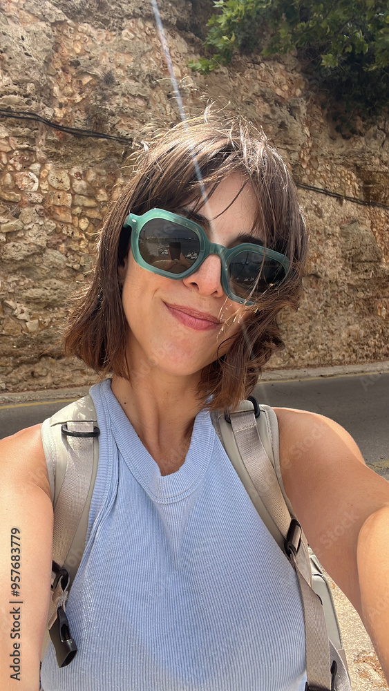 Tourist smiling in a Selfie in Green Sunglasses Tourist smiling in a Selfie in Green Sunglasses