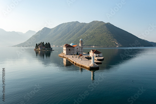 Island Our Lady of the Rock on sunrise, nobody around
 photo