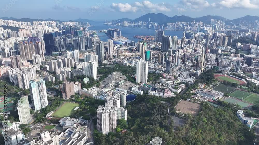 Seaside Commercial residential construction site in Kai Tak Cruise Terminal Hong Kong city, Kwun Tong, and Kowloon Bay near Victoria harbour, Aerial drone Skyview Seaside Commercial residential construction site in Kai Tak Cruise Terminal Hong Kong city, Kwun Tong, and Kowloon Bay near Victoria harbour, Aerial drone Skyview
