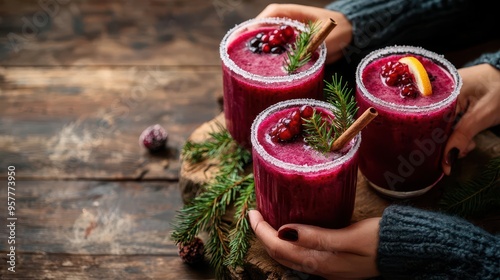 Chilled berry juice served in frosted glasses, surrounded by people in cozy sweaters, winter gathering, seasonal drinks photo