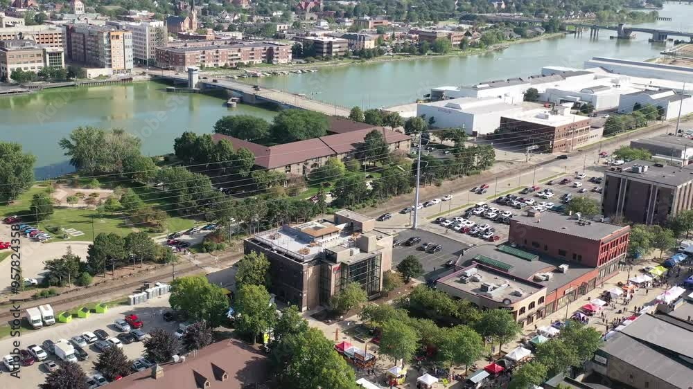 Downtown Green Bay, Wisconsin Fox River flyover during Farmers' Market on Broadway