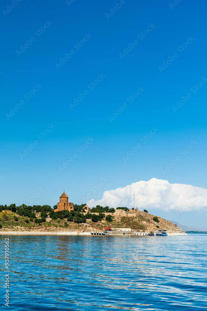 Akdamar Island in Van Lake with The Armenian Cathedral Church of the Holy Cross, a famous historic site in Van, Turkey Akdamar Island in Van Lake with The Armenian Cathedral Church of the Holy Cross, a famous historic site in Van, Turkey