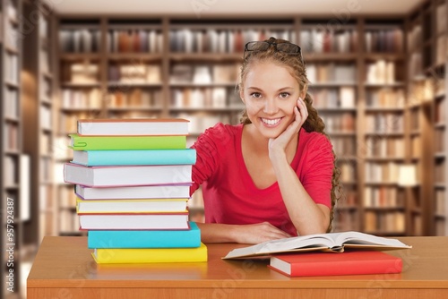 University student studying research in library