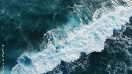 Spectacular aerial top view background photo of ocean sea water white wave splashing in the deep sea. Drone photo backdrop of sea wave in bird eye waves.
