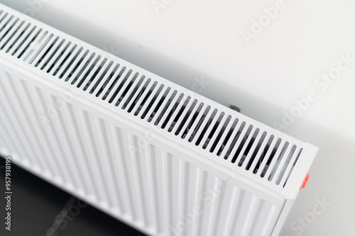 Wallpaper Mural A modern white radiator with sleek design, providing warmth in contemporary space. Torontodigital.ca