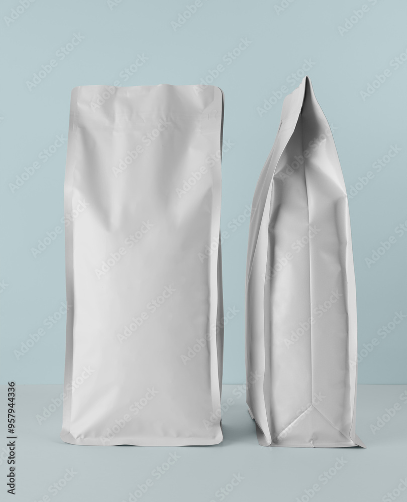 Foil plastic bag packaging with zipper and pile of seed for pet food or roasted coffee beans or tea,  template isolated on a white background. Package mock-up