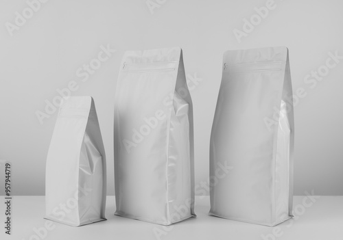 Foil plastic bag packaging with zipper and pile of seed for pet food or roasted coffee beans or tea,  template isolated on a white background. Package mock-up