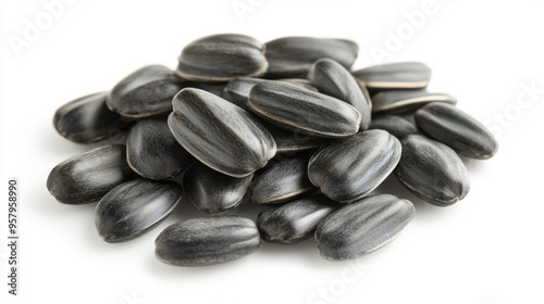 A close-up view of delicious sunflower black seeds, isolated on a clean white background, showcasing their rich texture and glossy finish photo