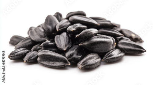 A close-up view of delicious sunflower black seeds, isolated on a clean white background, showcasing their rich texture and glossy finish photo