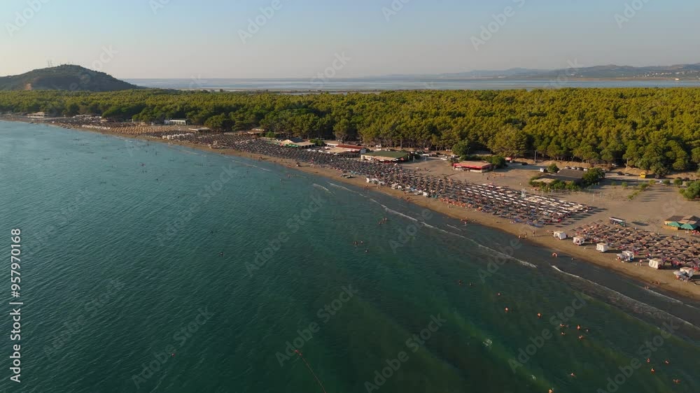 Narta beach in albania with clear sea, beautiful sand, and surrounding homes, aerial view Narta beach in albania with clear sea, beautiful sand, and surrounding homes, aerial view