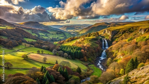 Pistyll Rhaeadr in the afternoon, panorama of the valley, the waterfall a subtle yet powerful presence, rolling hills and distant mountains fading into the horizon. photo