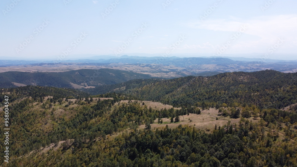 Obraz premium Very beautiful wooded mountain peaks