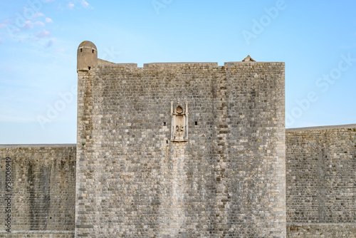 Medieval walls of the Old Walled City of Dubrovnik, UNESCO world heritage site at the Adriatic Sea in Croatia photo