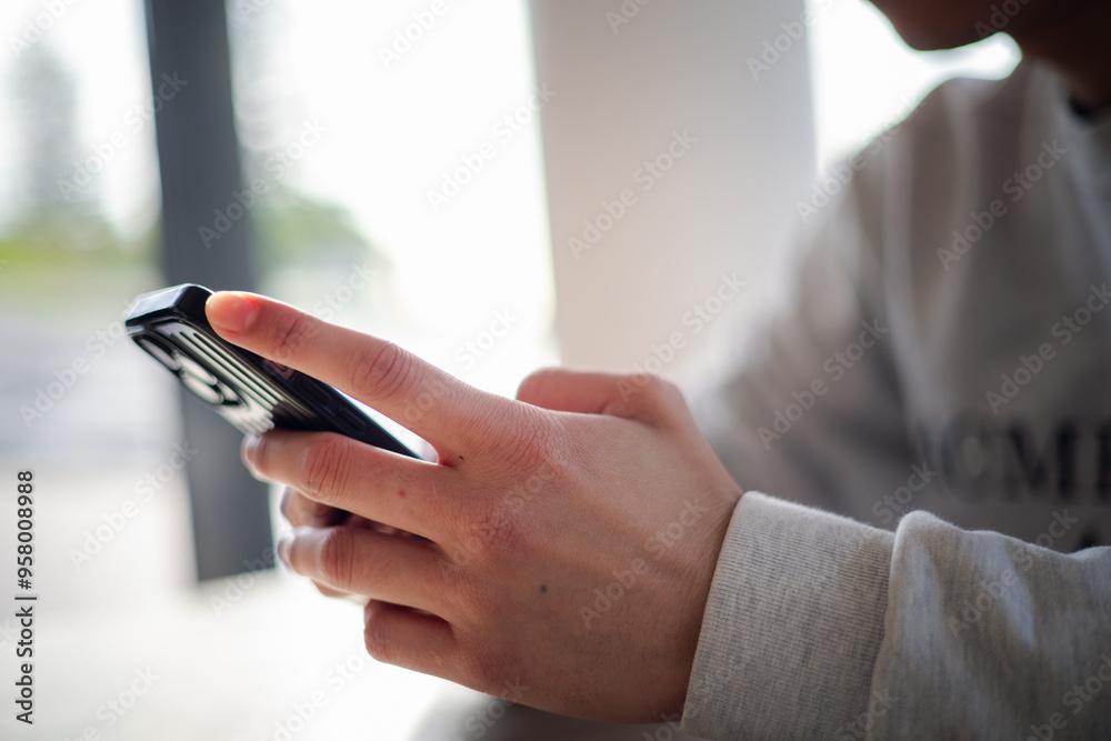 Close up man using smart phone, Social media marketing concept. hand using smartphone typing, chatting conversation in chat box icons pop up Close up man using smart phone, Social media marketing concept. hand using smartphone typing, chatting conversation in chat box icons pop up