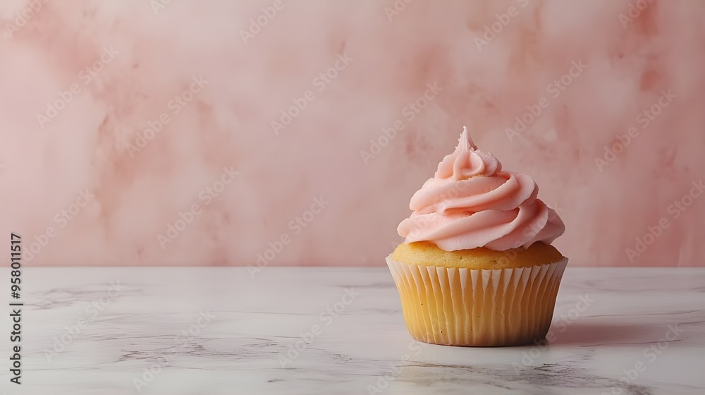 Single Pink Frosted Cupcake with Candle. Single Pink Frosted Cupcake with Candle.