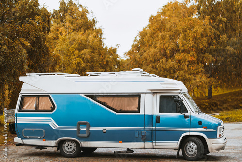 Camper van in a beautiful forest scene