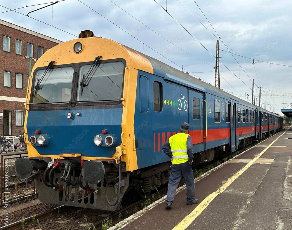 Passenger train at the station platform Passenger train at the station platform