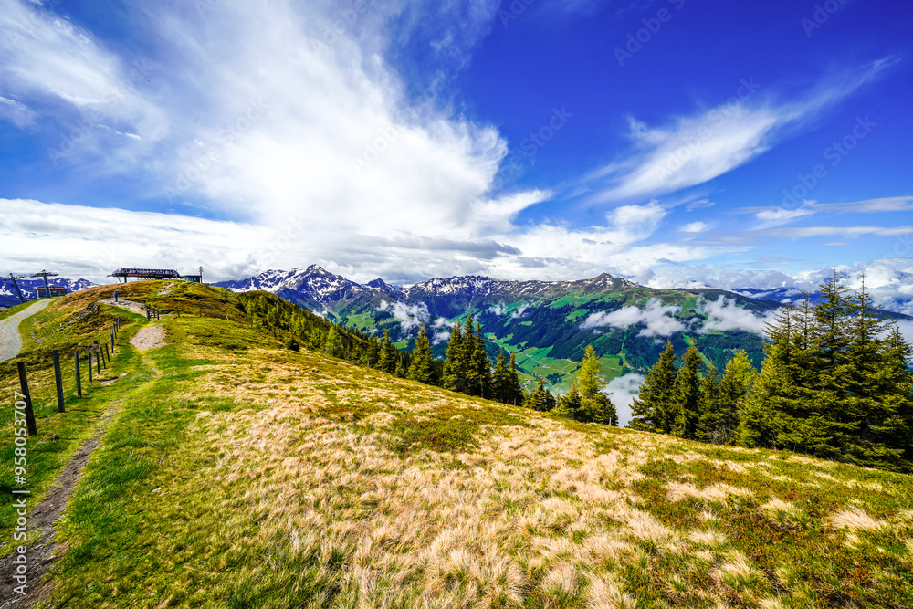 Fototapeta premium View from Schatzberg of the surrounding landscape. Idyllic nature in Wildschönau in the Kufstein district in Austria. Mountain landscape in the Kitzbühel Alps in Tyrol. 