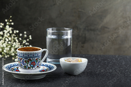 cup of turkish coffee with turksih delight photo