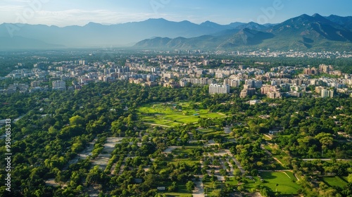 Top view of the city of Chandigarh, known for its grid pattern and green spaces, surrounded by the Shivalik hills. No people.
