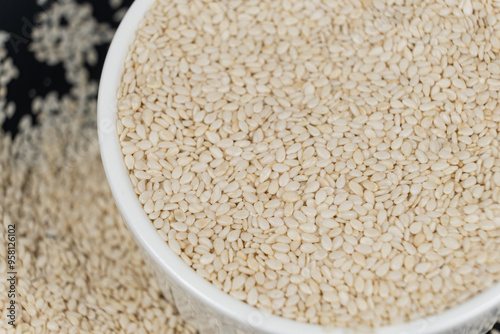 White roasted sesame seeds in a plate.