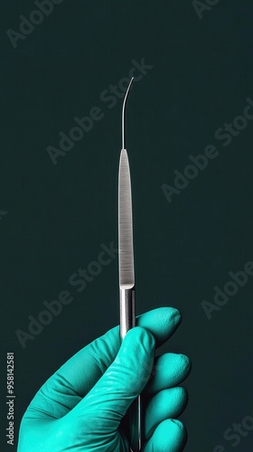 Close-up of a gloved hand holding a dental tool against a dark background, ideal for medical and dental equipment concepts. photo