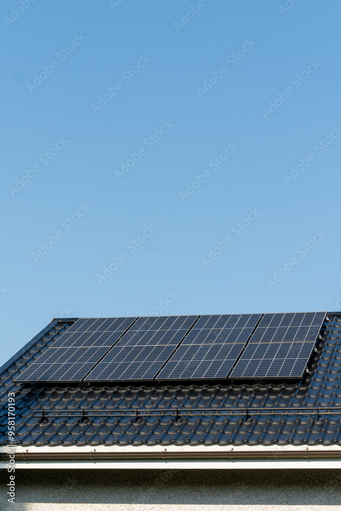solar panels on home roof against blue sky solar panels on home roof against blue sky