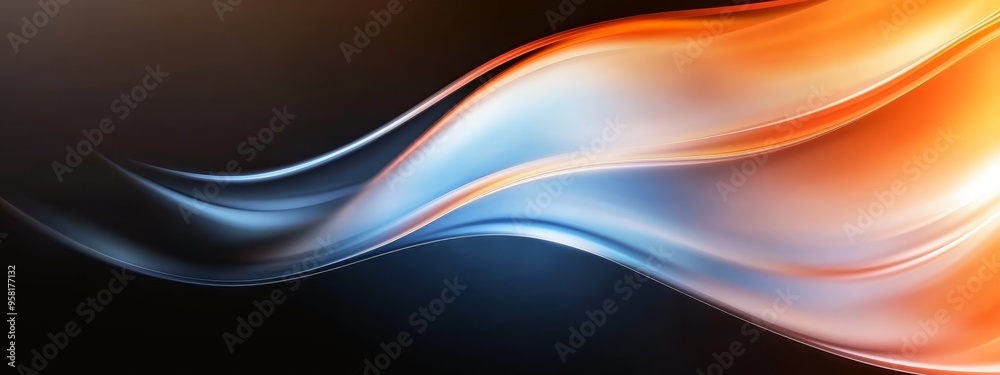 Fototapeta premium Close-up of an orange and blue wave against a black backdrop, with a gentle light reflection along its side